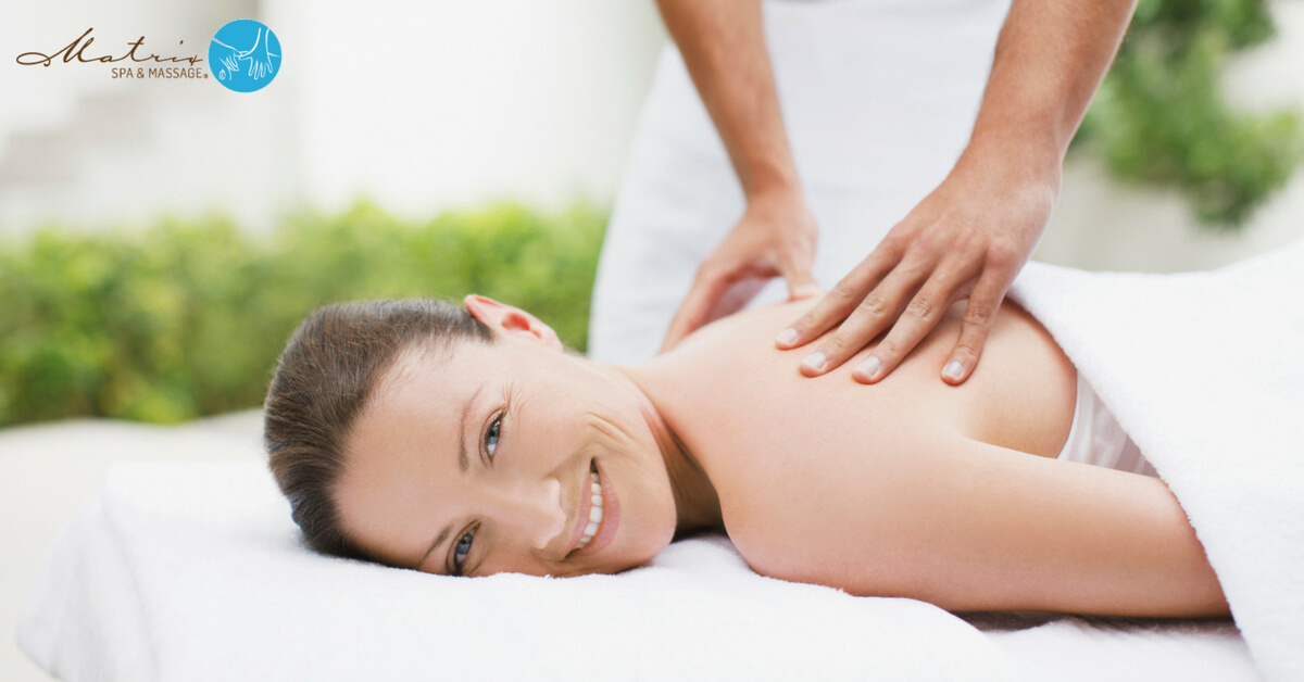 Woman receiving stress relieving massage