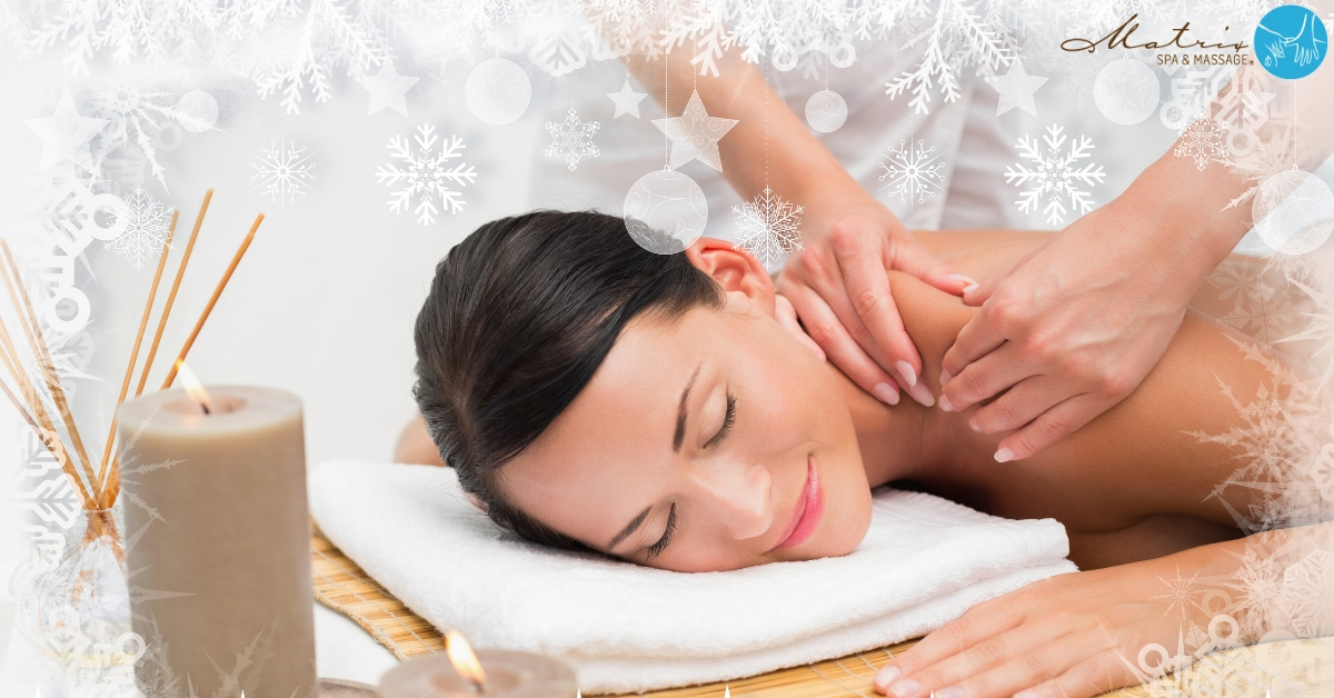 Woman receiving massage - Massage for Stiff Muscles and Joints During the Winter